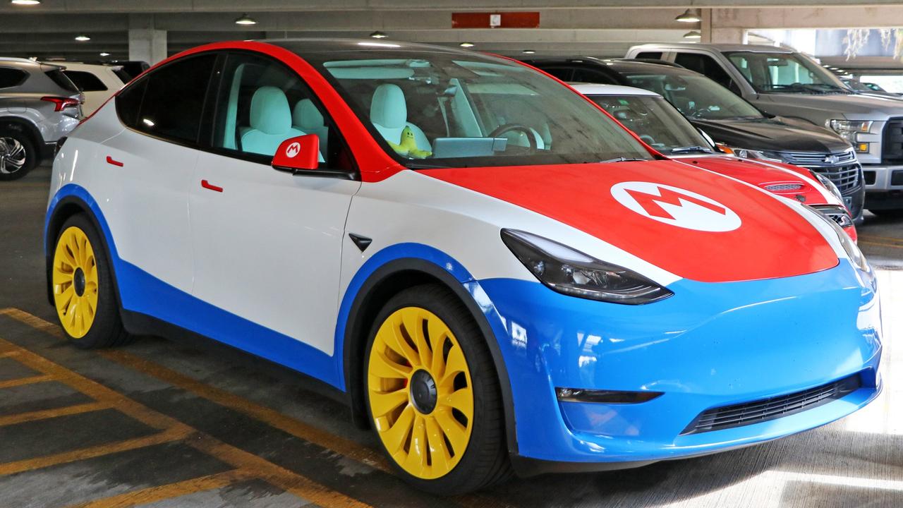 A Tesla Model Y with a Mario Kart body wrap has been spotted at Orlando airport. Picture: Facebook.