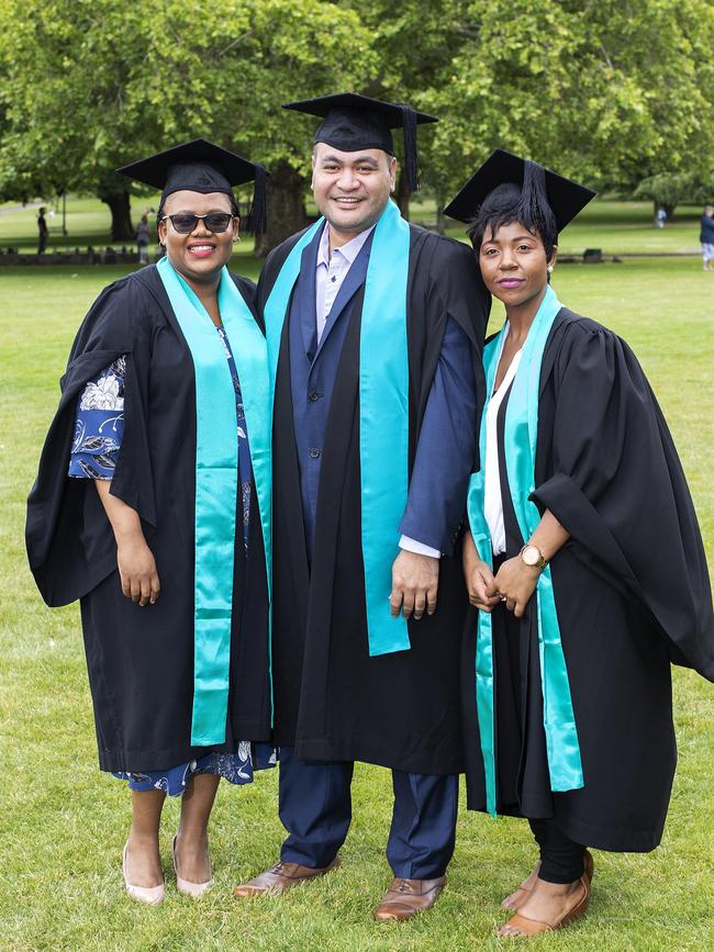 Annie Mathiba, Takavaha Vaokakala and Rumbidzai Chigwedere at the UTAS Graduation at Launceston. PICTURE CHRIS KIDD