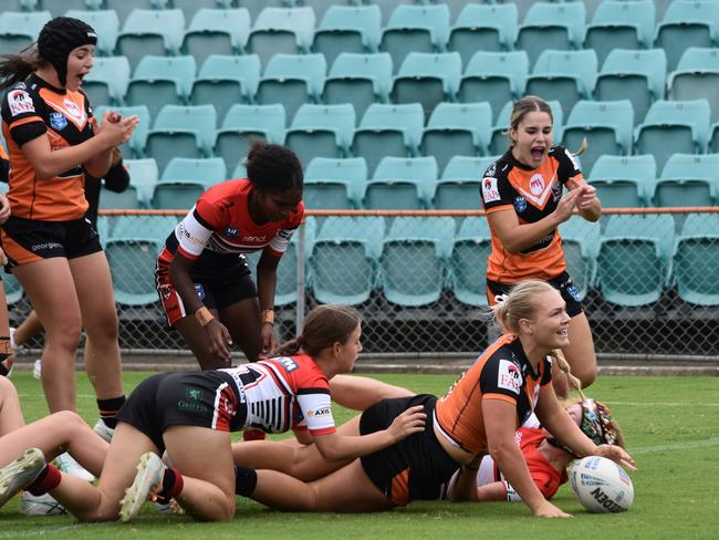 Abbie Hamilton scores her second try for the Tigers. Picture: Sean Teuma