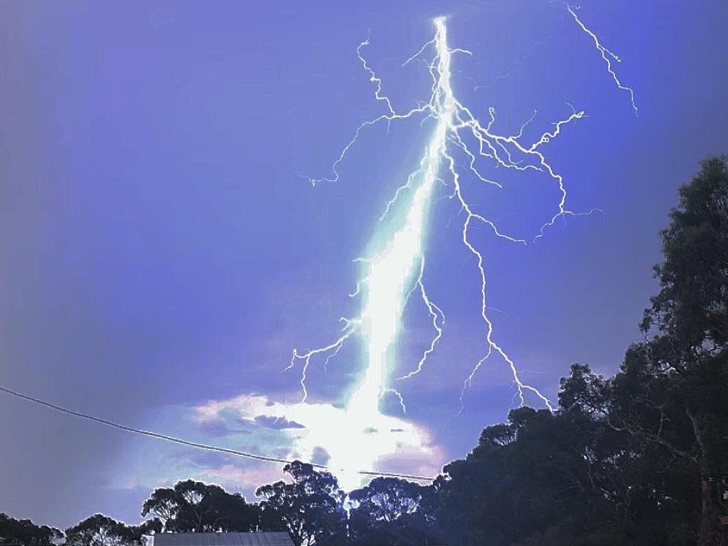 Lightning strike as seen from Dodges Ferry. Picture: Mel Bluett