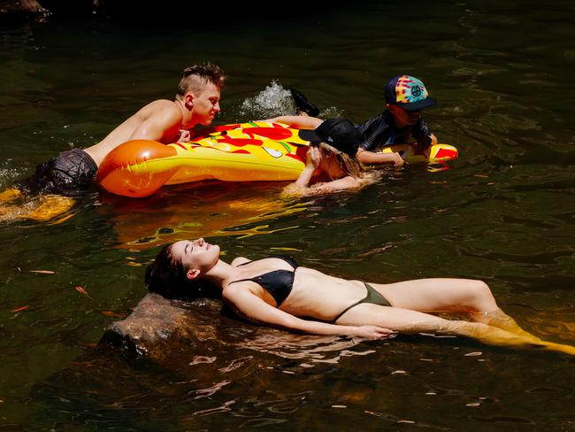 Sarah Henderson, 17, from Woodford cooling off at the Jellybean Pool in the Blue Mountains National Park at Glenbrook. Picture: Jonathan Ng