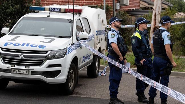 Police at the scene where a relative was called about 4am. Picture: Monique Harmer 