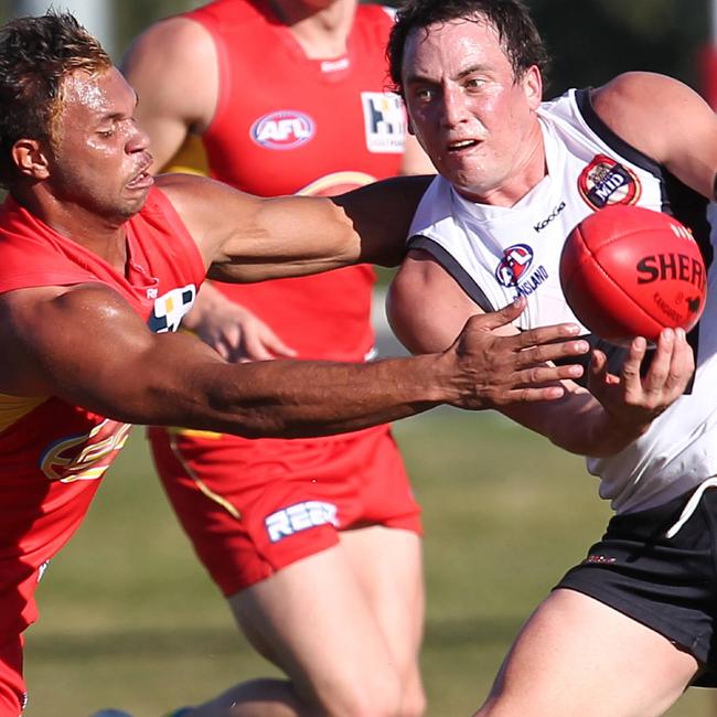 Southport Sharks v Gold Coast Suns. (L-R) Rex Liddy (suns) Matthew Payne (sharks)