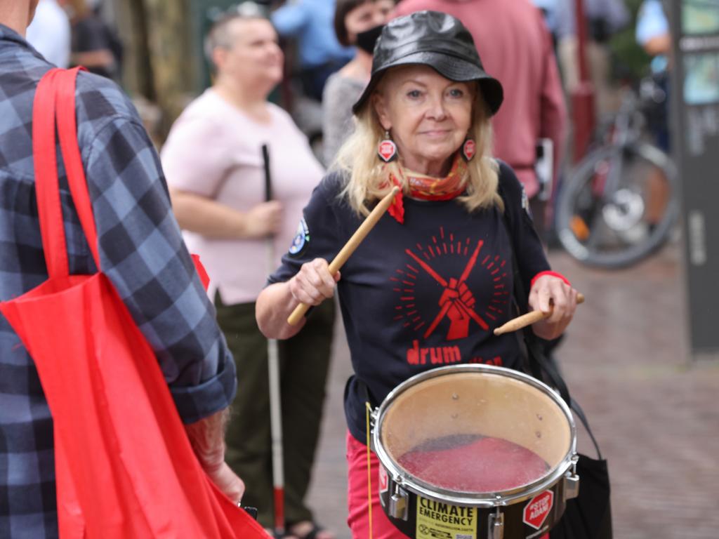 A protester bangs the drums outside state Parliament in Sydney CBD at the Snap Action against anti-protest laws and state repression rally on Wednesday. Picture: NCA NewsWire / Damian Shaw