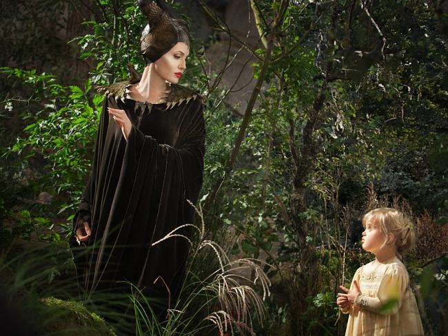 Is that you, mum? Vivienne Jolie-Pitt looks into the face of her mother, Angelina, while playing a young Princess Aurora in Disney’s new film, Maleficent. Picture: Frank Connor/Disney Enterprises