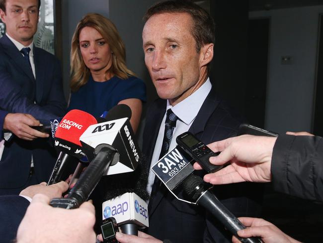 Damien Oliver addresses the media after his appeal against his 20-meeting suspension handed out following his Cox Plate ride was dismissed. Picture: Getty Images