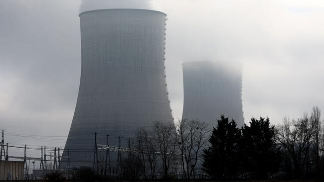 This photograph shows two cooling towers of the Civaux nuclear power plant in Civaux, central France, on December 15, 2024. (Photo by ROMAIN PERROCHEAU / AFP)