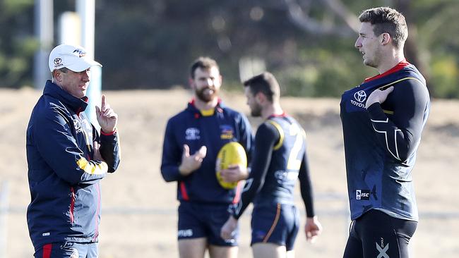 Crows coach Don Pyke talks to forward Josh Jenkins at training last week. Picture: SARAH REED