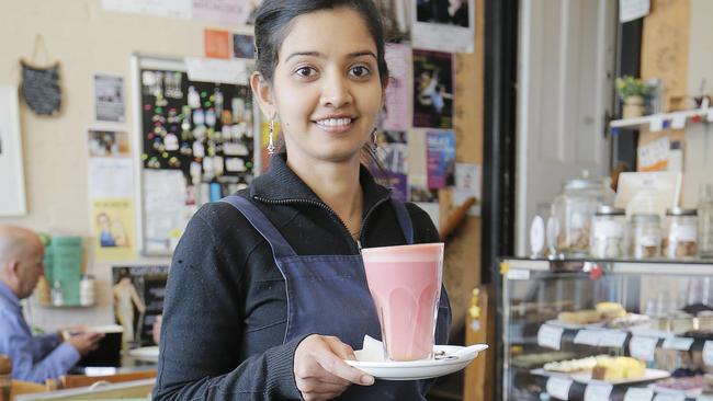Five of the Best Lattes - Neela Mbika serves Macquarie Street Food Store's Beetroot latŽ.Picture: MATHEW FARRELL