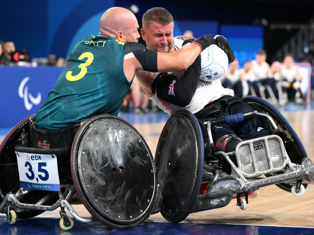 Stuart Robinson of Team Great Britain, right, is challenged by Ryley Batt of Team Australia during the Men's preliminary round Group B match. Picture: David Ramos/Getty Images