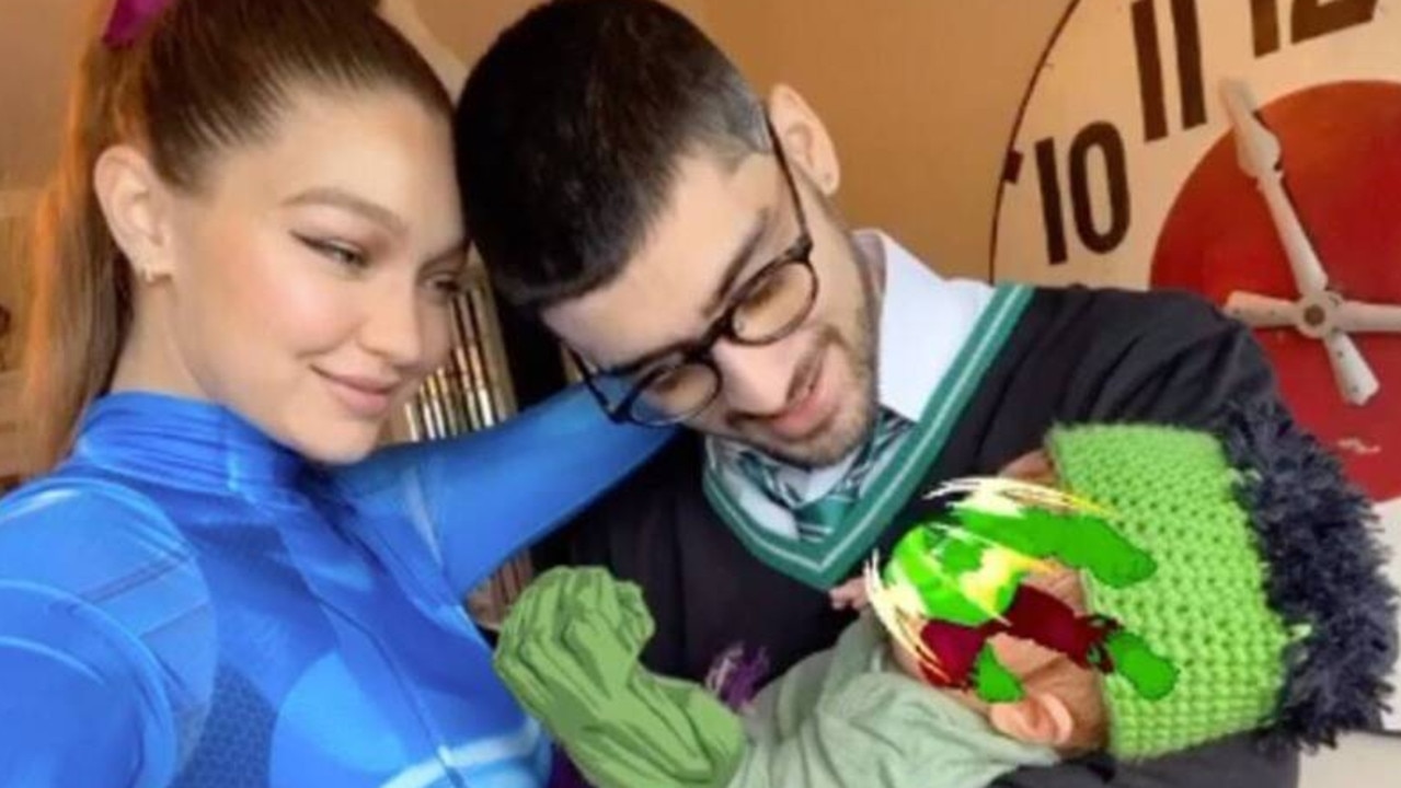 Gigi shared her first family photo with Zayn and their daughter on Halloween