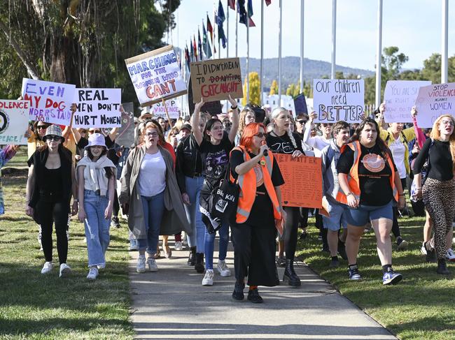 CANBERRA, Australia, NewsWire Photos. April 28, 2024: Demonstrators arrive at the No More! National Rally Against Violence march at Parliament House in Canberra, as 29 Women have been killed as a result of violence by men already this year. NCA NewsWire / Martin Ollman