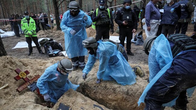 Despite the scale of the makeshift cemetery, bodies are believed to have been buried individually. Picture: Gleb Garanich/REUTERS/The Times