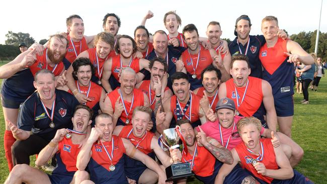 Chelsea Heights shows off the premiership cup.