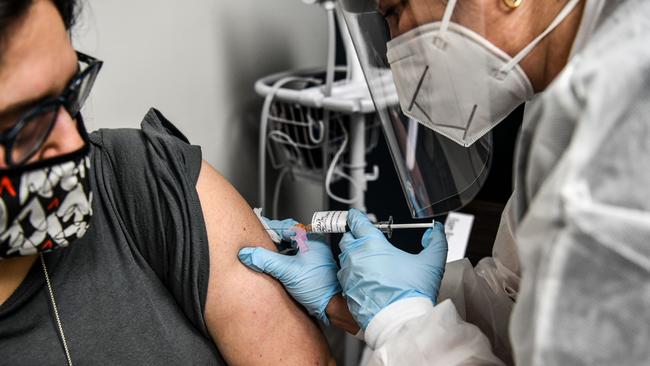 Participants in some vaccine trials will be monitored for up to two years to ensure there are no adverse side effects. Picture: Chandan Khanna/AFP