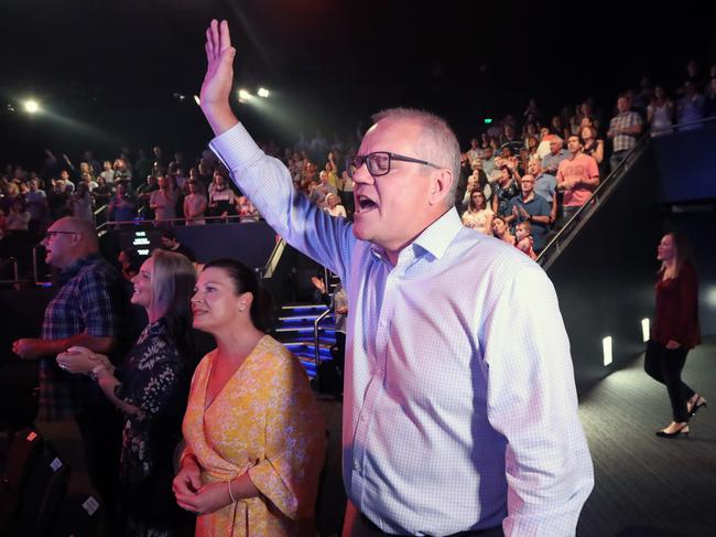 Prime Minister Scott Morrison was criticised for his stance while celebrating Easter Sunday at the Horizon Church in Sutherland joining other members who were all singing. Picture: Gary Ramage