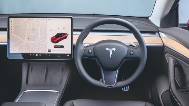 The Tesla’s cabin is bare compared to the others. Picture: Thomas Wielecki