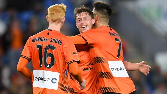 Joe Knowles celebrates a goal for Brisbane Roar against Leeds United.