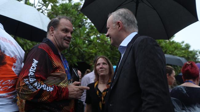 Mr Albanese socialising with locals after the event.