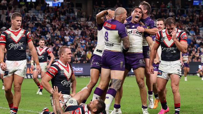 SYDNEY, AUSTRALIA - APRIL 18:  Xavier Coates of the Storm celebrates with team mates after scoring a try during the round seven NRL match between Sydney Roosters and Melbourne Storm at Allianz Stadium on April 18, 2024, in Sydney, Australia. (Photo by Cameron Spencer/Getty Images)