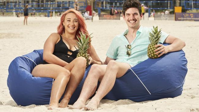 Emily Jones and Michael Esterhuizen at Glenelg beach, where the Moseley Beach Club has secured another four years. Picture: Matt Loxton