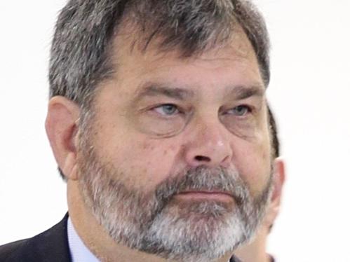 Chief Justice Tim Carmody arrives at the Brisbane International Airport. Photographer: Liam Kidston.