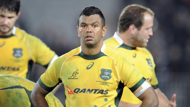 In this photo taken on Aug. 23, 2014 Australia’s Kurtley Beale reacts after the team was defeated by New Zealand during the International test Bledisloe Cup rugby match at Eden Park in Auckland, New Zealand. After a week of turmoil involving a star player and speculation over his coaching future, Ewen McKenzie has recalled Christian Leali'ifano to fill in for the suspended Beale in Australia's midfield for Saturday's test on Oct. 18, 2014, against New Zealand.(AP Photo/SNPA, Ross Setford) NEW ZEALAND OUT