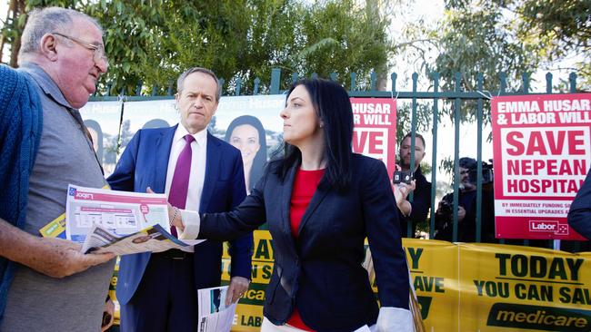 Lindsay member-elect, Labor’s Emma Husar with Opposition leader Bill Shorten talking to voters outside Bennett Road Public School, Colyton on election day. Picture: Jenny Evans