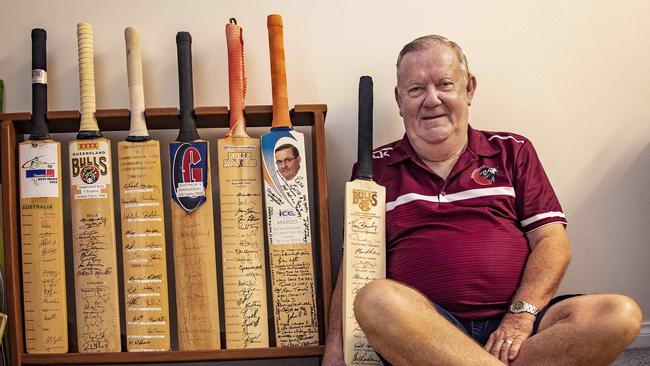 Queensland Country Cricket Association supremo Kevin Maher with his Queensland cricket memorabilia including the signed bat from the first Queensland Sheffield Shield winning team (1994.95). Picture: Brian Cassey