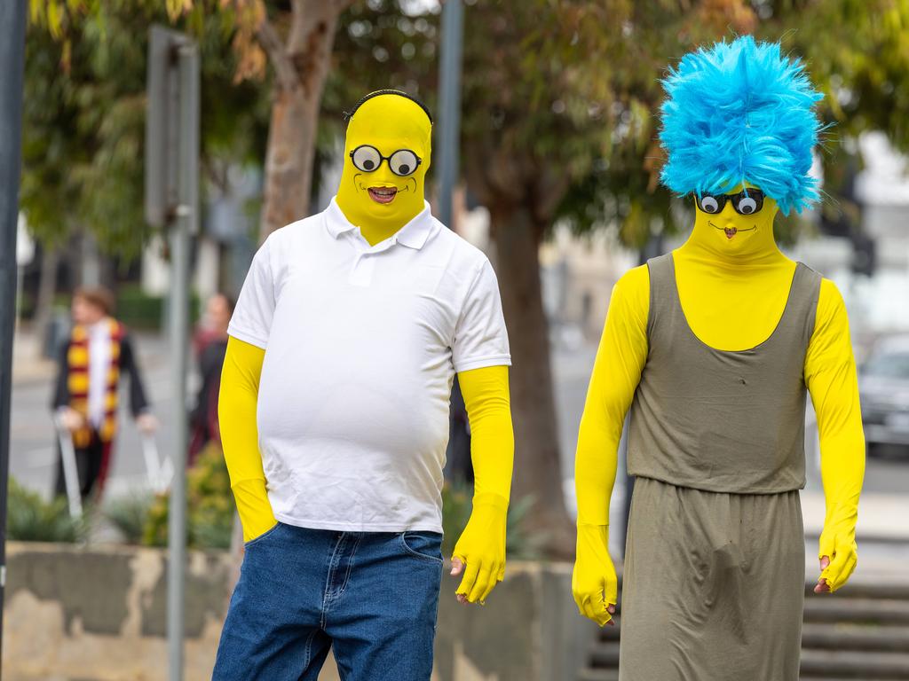 Oscar Murdoch and Jhye Clark as Homer and Marge Simpson. Geelong Football Club Cats players turn up to Wharf Shed for Mad Monday celebrations. Picture: Jason Edwards