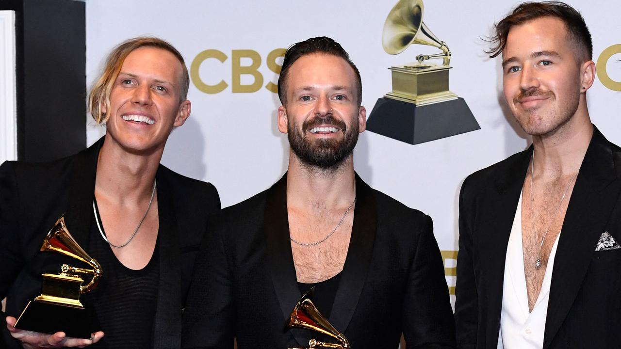 Australian group Rufus Du Sol – Tyrone Lindqvist, Jon George and James Hunt – after winning Best Dance/Electronic Recording for Alive during the 64th Annual Grammy Awards last April. Picture: Patrick T. Fallon/AFP