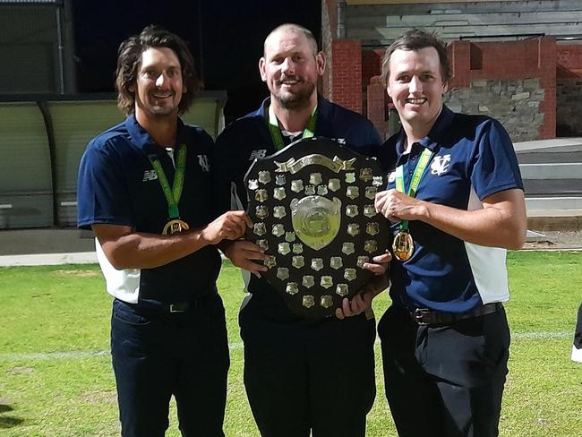 Nathan Freitag with Vics coach Luke Manders and captain Jake Toohey.