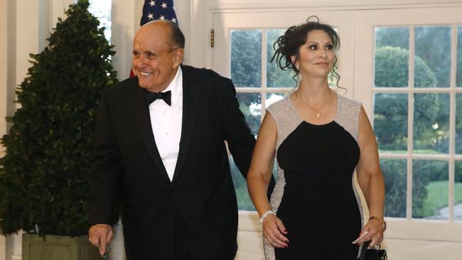 Rudy Giuliani, an lawyer for President Donald Trump, and Maria Ryan arrive for a state dinner with Prime Minister Scott Morrison and President Donald Trump at the White House on Saturday.