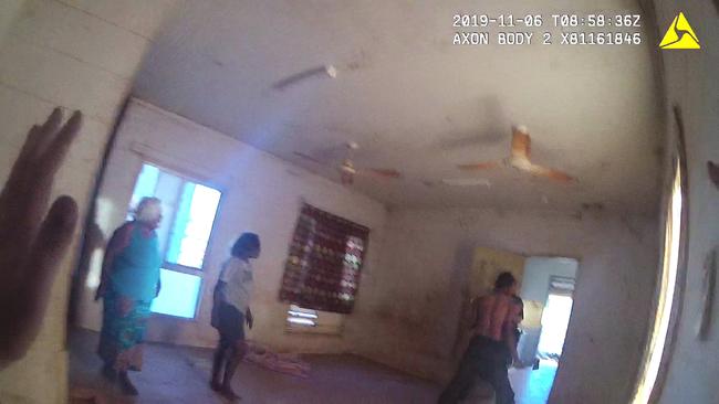 NT Police body-cam footage showing Kumanjayi Walker with an axe the day before he was shot.