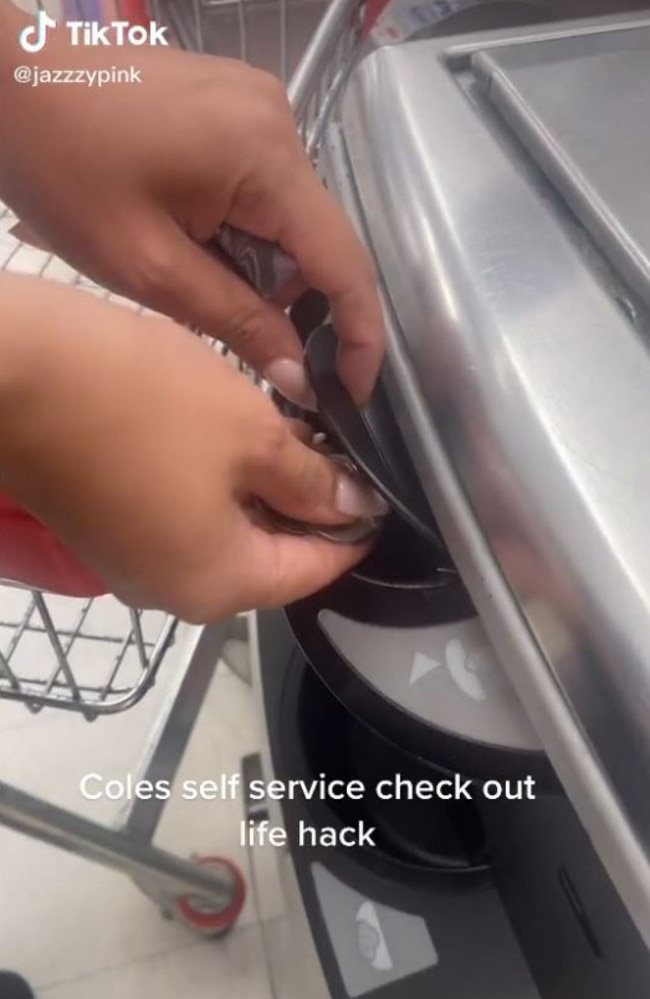 It shows her lifting the coin deposit flap and dumping a handful of coins in the slot to speed up the checkout process. Picture: TikTok