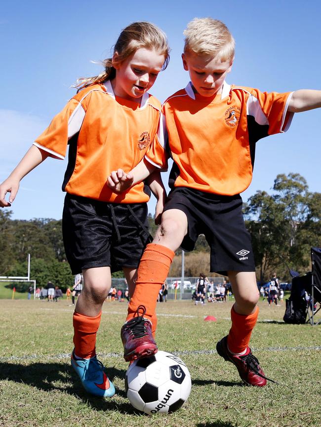 Kids just want to have fun: Sophie Homan-Corless and Max James at Duffys Oval in Terrigal on Saturday. Picture: Peter Clark