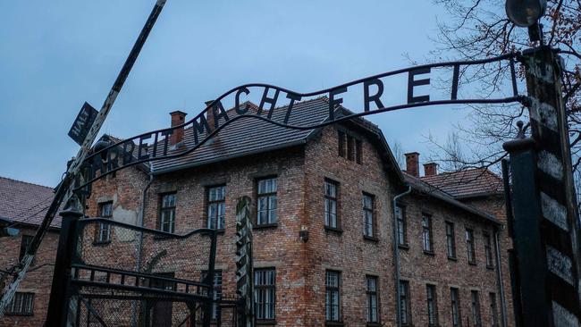 The gate with Arbeit macht frei (Work sets you free) written across at the Auschwitz-Birkenau extermination camp. Picture: Bartosz Siedlik/AFP