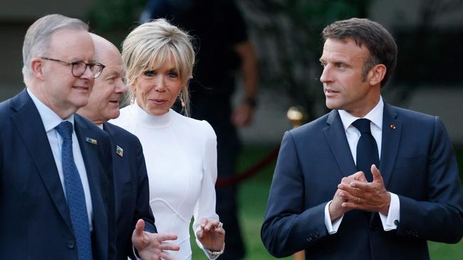 Prime Minister Anthony Albanese, Germany's Chancellor Olaf Scholz, Brigitte Macron and France's President Emmanuel Macron walk ahead of the social dinner during the NATO summit, at the Presidential Palace in Vilnius. Picture: Ludovic Marin/Pool/AFP