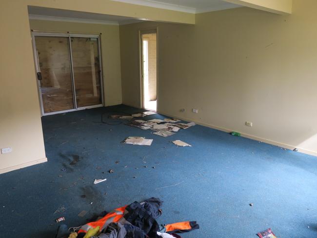 Animal faeces and unidentified stains on the carpet of a social housing duplex at 5-7 Faye Close, at Bateau Bay which has been left vacant for 14 years. Picture: supplied