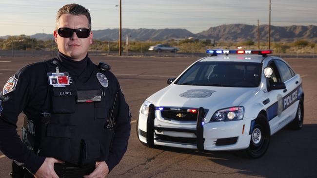 An Arizona police officer with an Australian-made Holden Caprice, exported to the US as a Chevrolet police car since 2010. Picture: Supplied.