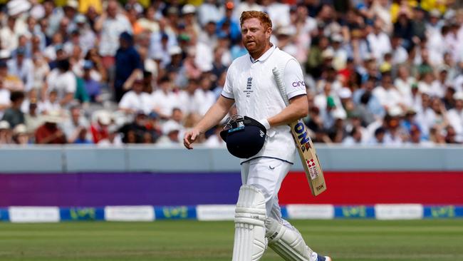 England's Jonny Bairstow walks back to the pavilion after losing his wicket for 10 runs on day five of the second Ashes cricket Test match. Picture: AFP