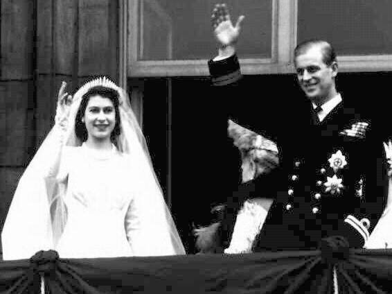 The newlyweds wave from the balcony of Buckingham Palace after their marriage at Westminster Abbey. Philip was made Duke of Edinburgh, Earl of Merioneth and Baron Greenwich on the morning of the wedding, but would not be granted the title of a British prince until ten years later in 1957. Picture: AP