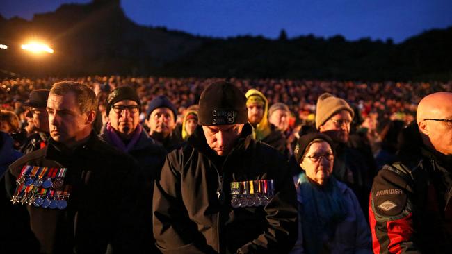 GALLIPOLI, TURKEY - APRIL 25: Visitors from Australia and New Zealand attend a dawn ceremony marking the 100th anniversary of the Battle of Gallipoli, at Anzac Cove on April 25, 2015 in Gallipoli, Turkey. Turkish and Allied powers representatives, as well as family members of those who served, are commemorating the 100th anniversary of the Gallipoli campaign with ceremonies at memorials across the Gallipoli Peninsula. The Gallipoli land campaign, in which a combined Allied force of British, French, Australian, New Zealand and Indian troops sought to occupy the Gallipoli Peninsula and the strategic Dardanelles Strait during World War I, began on April 25, 1915 against Turkish forces of the Ottoman Empire. The Allies, unable to advance more than a few kilometers, withdrew after eight months. The campaign cost the Allies approximately 50,000 killed and up to 200,000 wounded, the Ottomans approximately 85,000 killed and 160,000 wounded. (Photo by Gokhan Tan/Getty Images)