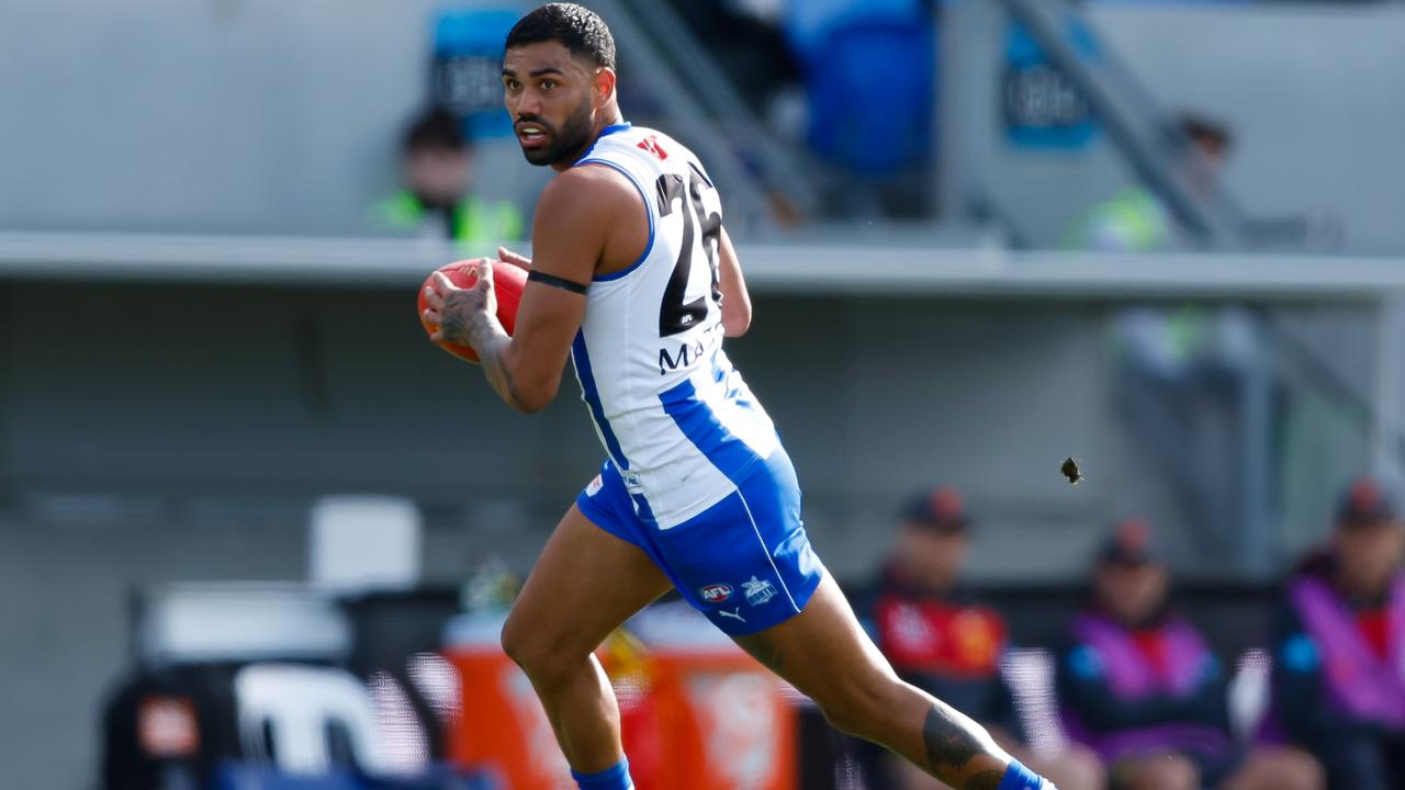HOBART, AUSTRALIA - AUGUST 26: Tarryn Thomas of the Kangaroos in action during the 2023 AFL Round 24 match between the North Melbourne Kangaroos and the Gold Coast SUNS at Blundstone Arena on August 26, 2023 in Hobart, Australia. (Photo by Dylan Burns/AFL Photos via Getty Images)