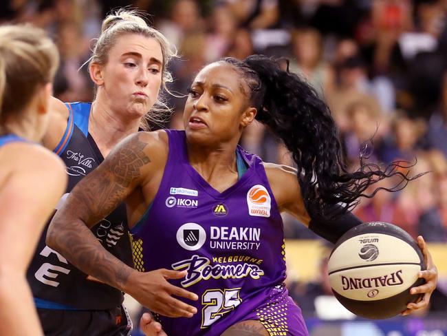 MELBOURNE, AUSTRALIA - DECEMBER 07: Tiffany Mitchell of the Boomers handles the ball against Lauren Nicholson of the Fire during the round five WNBL match between Melbourne Boomers and Townsville Fire at State Basketball Centre, on December 07, 2022, in Melbourne, Australia. (Photo by Kelly Defina/Getty Images)