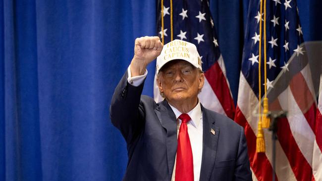 Former US President and 2024 Republican presidential hopeful Donald Trump raises his fist at an event at Simpson College in Indianola, Iowa. Picture: AFP