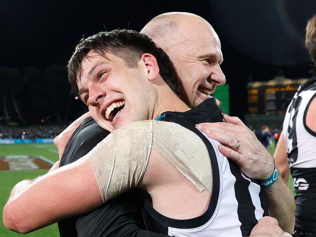 Ken Hinkley embraces Zak Butters after a win. Picture: Michael Willson/AFL Photos via Getty Images