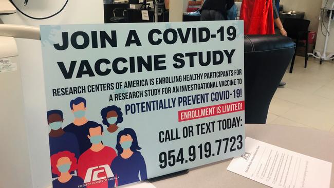 A sign inviting volunteers to join a vaccine study at the Research Centers of America in Hollywood, Florida. Picture: AFP