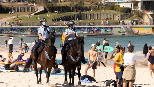 Mounted Police patrol Bondi Beach in Sydney's east as part of public health order compliance operations on Sunday. Photo: Getty Images
