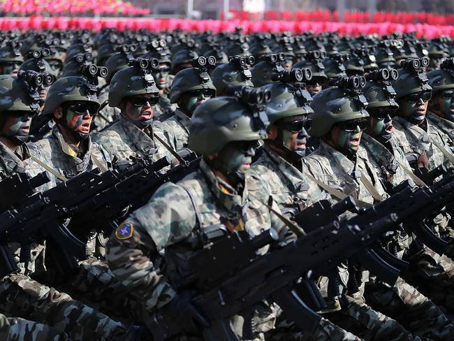 CORRECTION - This photo taken on February 8, 2018 and released on February 9, 2018 by North Korea's official Korean Central News Agency (KCNA) shows North Korean soldiers marching during the military parade to mark the 70th anniversary of the Korean People's Army at Kim Il Sung Square in Pyongyang. North Korea staged a military parade in Pyongyang on February 8 to mark the 70th anniversary of its armed forces, putting its intercontinental ballistic missiles on show just a day before the Winter Olympics open in the South. / AFP PHOTO / KCNA via KNS / KCNA VIA KNS / South Korea OUT / REPUBLIC OF KOREA OUT   ---EDITORS NOTE--- RESTRICTED TO EDITORIAL USE - MANDATORY CREDIT "AFP PHOTO/KCNA VIA KNS" - NO MARKETING NO ADVERTISING CAMPAIGNS - DISTRIBUTED AS A SERVICE TO CLIENTS THIS PICTURE WAS MADE AVAILABLE BY A THIRD PARTY. AFP CAN NOT INDEPENDENTLY VERIFY THE AUTHENTICITY, LOCATION, DATE AND CONTENT OF THIS IMAGE. THIS PHOTO IS DISTRIBUTED EXACTLY AS RECEIVED BY AFP.  / “The erroneous mention[s] appearing in the metadata of this photo from North Korea has been modified in AFP systems in the following manner: [BYLINE to KCNA via KNS] instead of [JIJI PRESS]. Please immediately remove the erroneous mention[s] from all your online services and delete it (them) from your servers. If you have been authorized by AFP to distribute it (them) to third parties, please ensure that the same actions are carried out by them. Failure to promptly comply with these instructions will entail liability on your part for any continued or post notification usage. Therefore we thank you very much for all your attention and prompt action. We are sorry for the inconvenience this notification may cause and remain at your disposal for any further information you may require.”